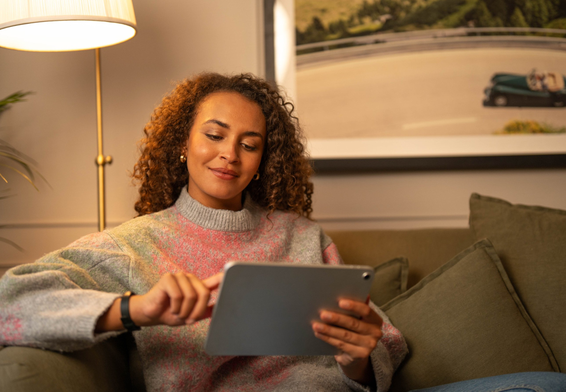 JamStorage customer checking her stored items in the online portal on a tablet